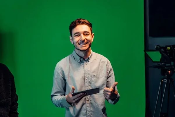 Example of person lit in front of green screen.