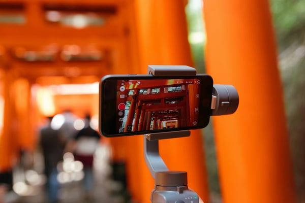 Close-up of smartphone on tripod.