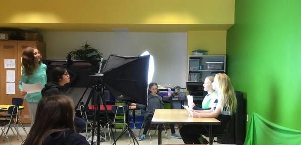 Students at Yealey Elementary recording a video in the classroom.