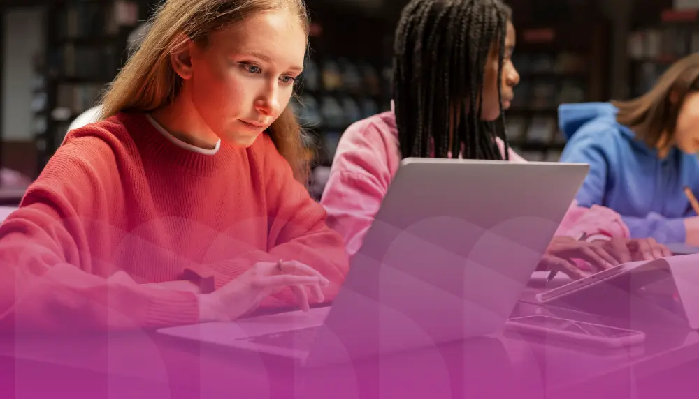 Students working on laptops.