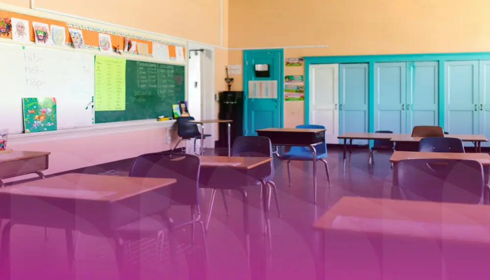 Empty classroom. Magenta filter over image.