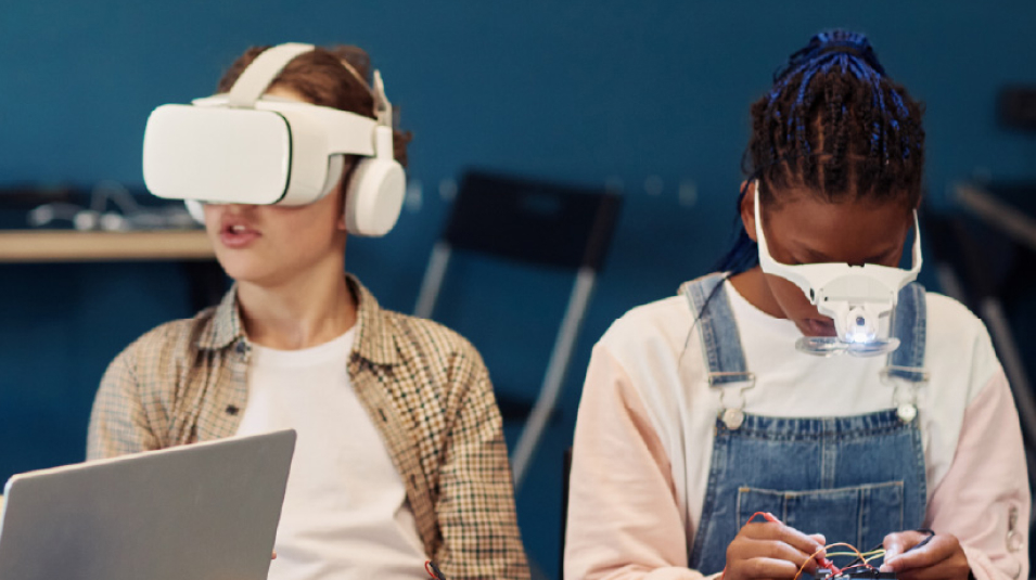 Three K12 students working on AI projects