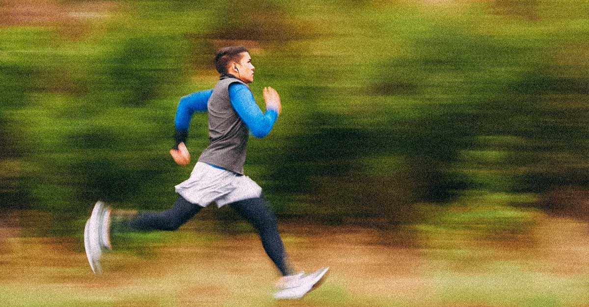 Side view of man running with motion blur on legs and arms