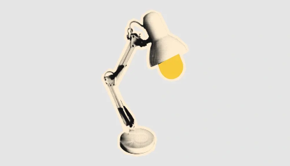 Retro desk lamp graphic atop gray background. 