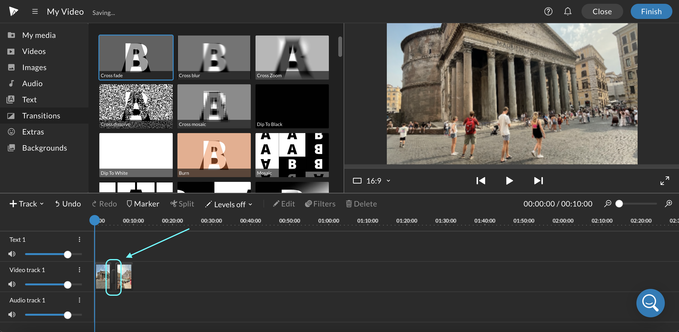 Blue arrow pointing towards the transition between two clips in the WeVideo timeline editor.