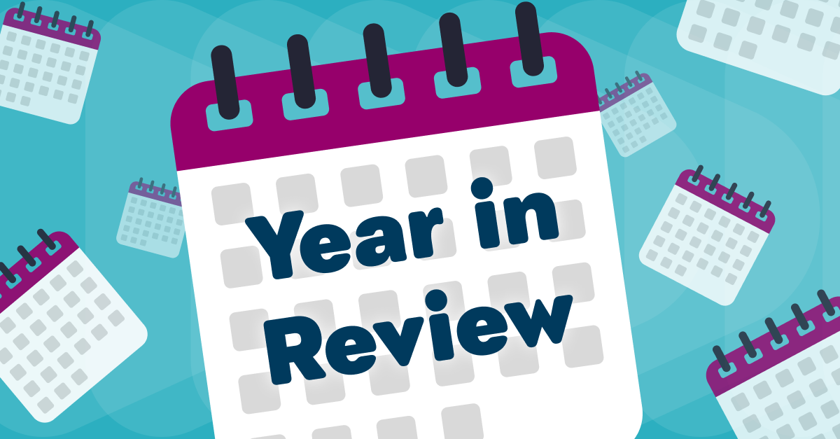 Illustration of falling calendars with dark navy text that says Year in Review.